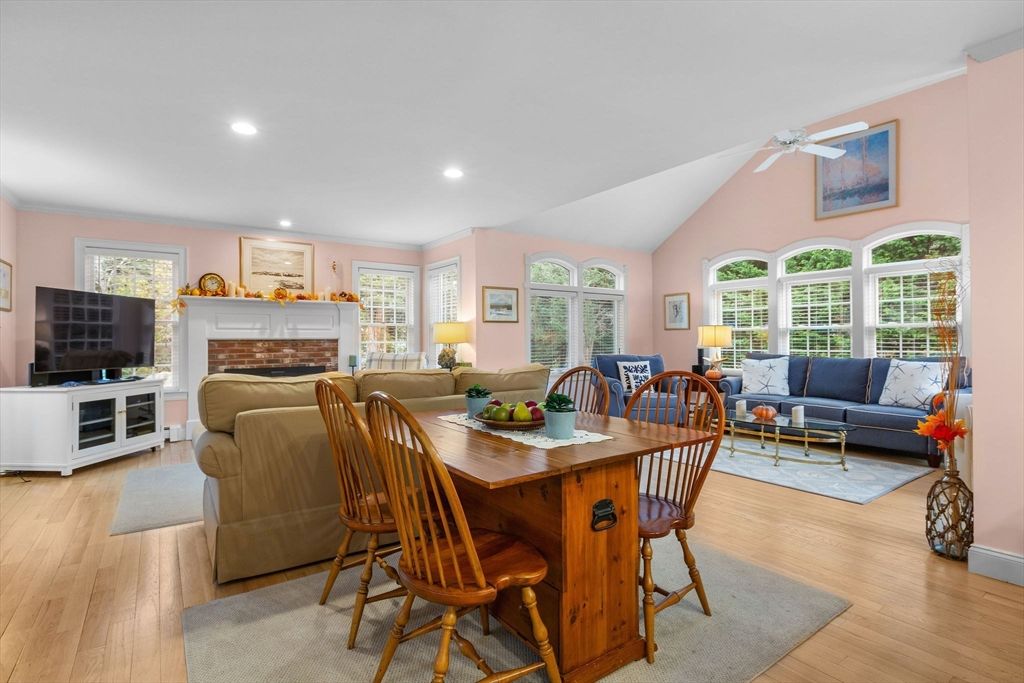 Dining room, Fireplace, Interior, Living room, Recessed Lighting, Wood Texture Flooring