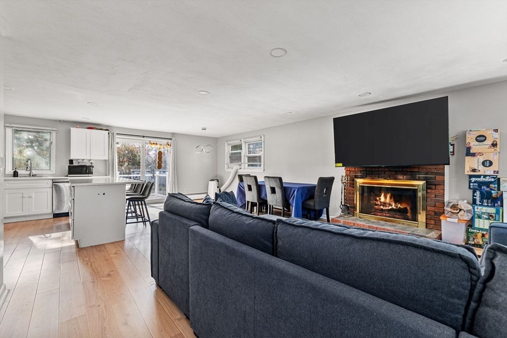 Dining room, Fireplace, Interior, Kitchen, Living room, Recessed Lighting, Wood Texture Flooring