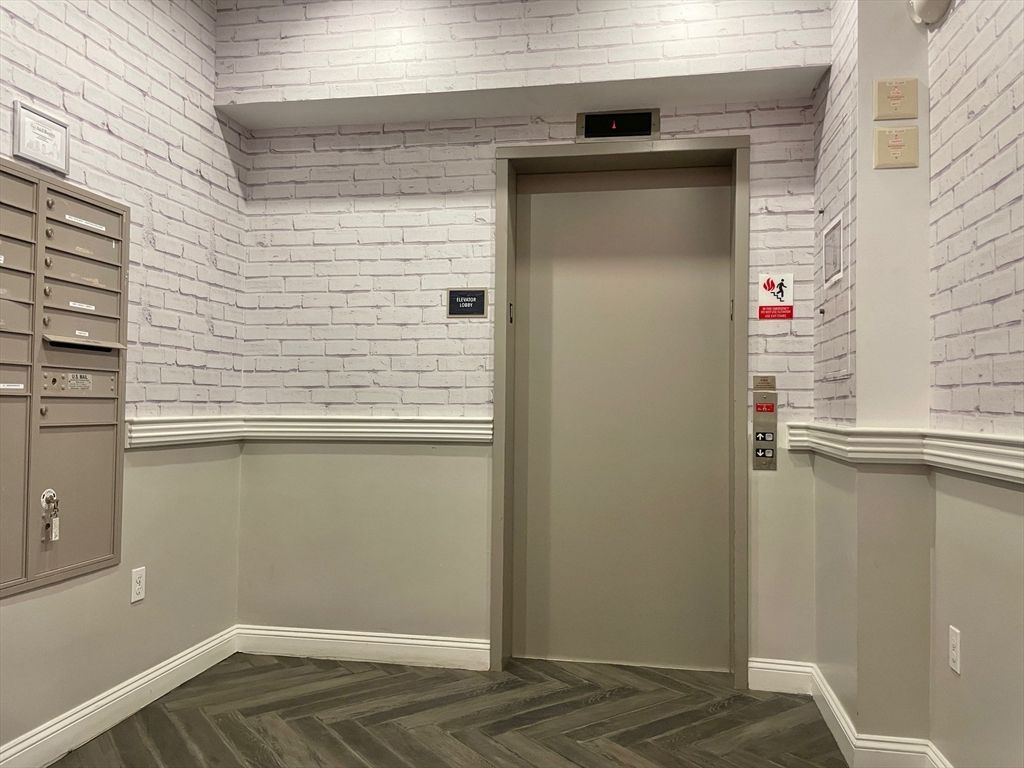 Elevator, Interior, Stone Walls, Wood Texture Flooring