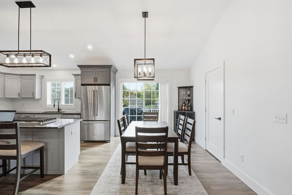 Dining room, Interior, Kitchen, Pendant Lights, Recessed Lighting, Stainless Steel Appliances, Wood Texture Flooring