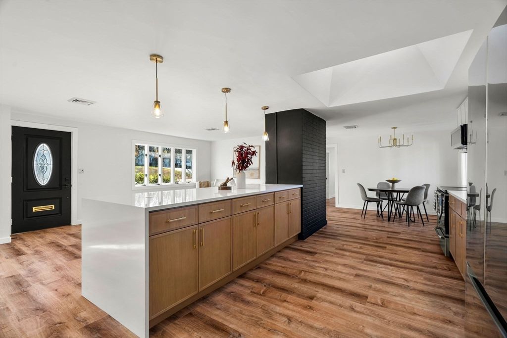 Dining room, Fireplace, Interior, Pendant Lights, Wood Texture Flooring