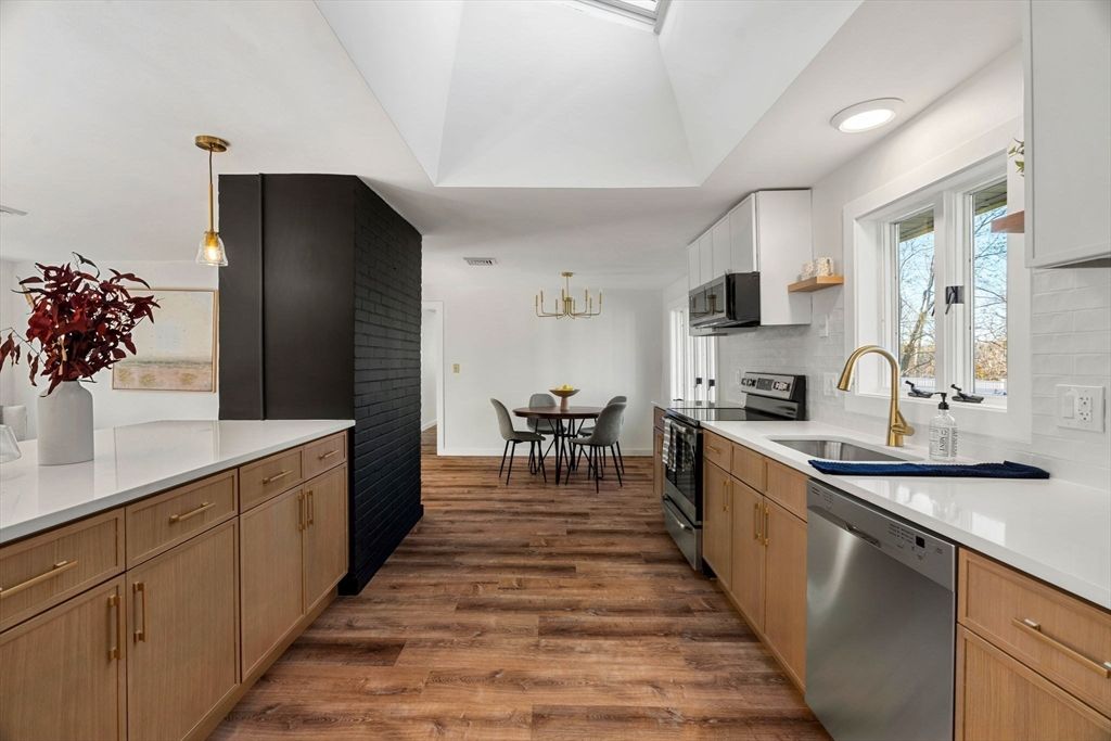 Dining room, Interior, Kitchen, Pendant Lights, Recessed Lighting, Stainless Steel Appliances, Wood Texture Flooring