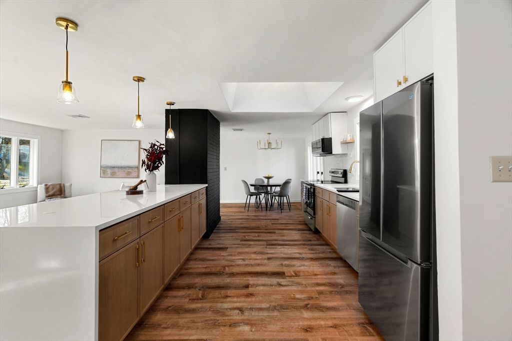 Dining room, Interior, Kitchen, Pendant Lights, Stainless Steel Appliances, Wood Texture Flooring