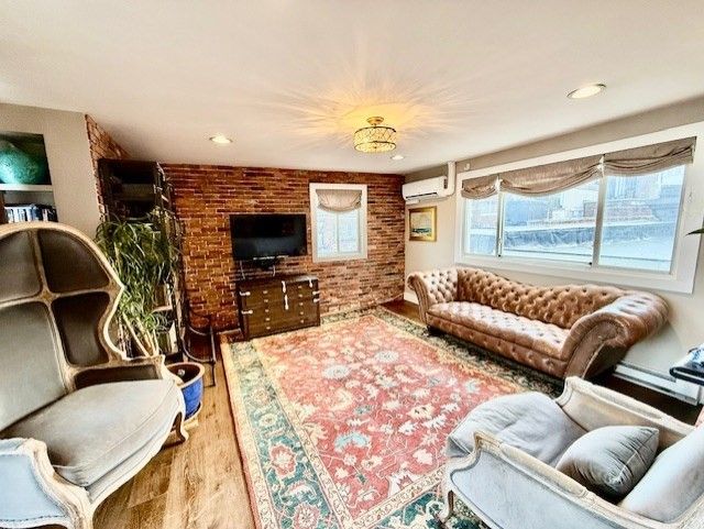 Interior, Living room, Recessed Lighting, Stone Walls, Wood Texture Flooring