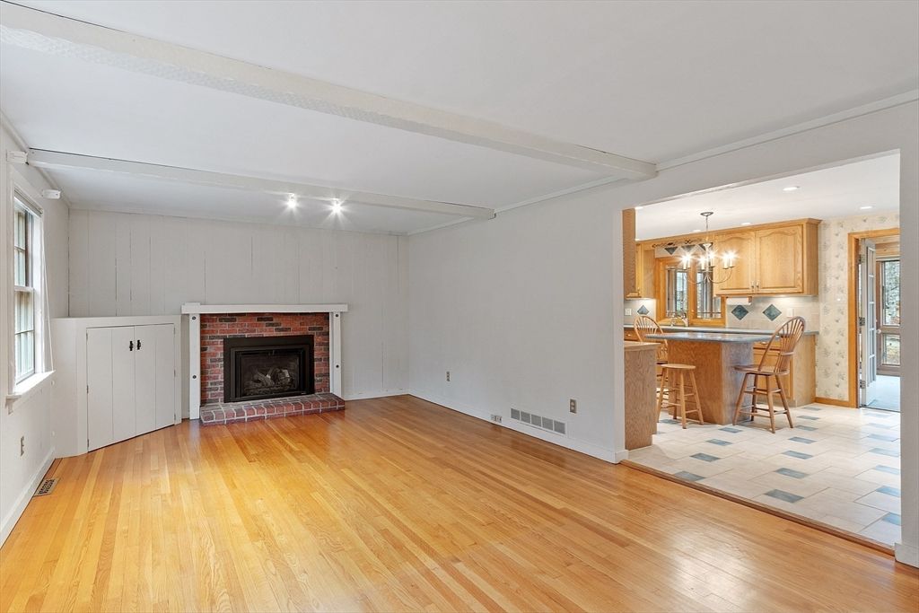 Chandelier, Empty room, Fireplace, Interior, Kitchen, Recessed Lighting, Wood Texture Flooring
