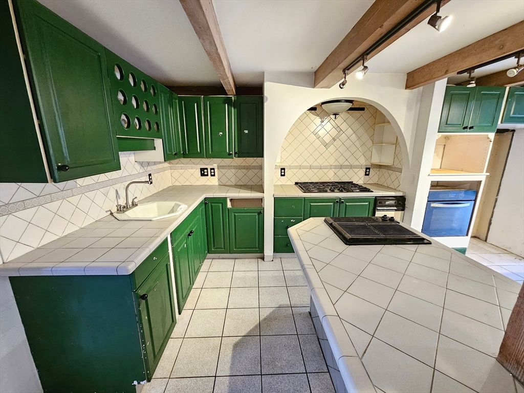 Interior, Kitchen, Tile Countertops, Wooden Beams