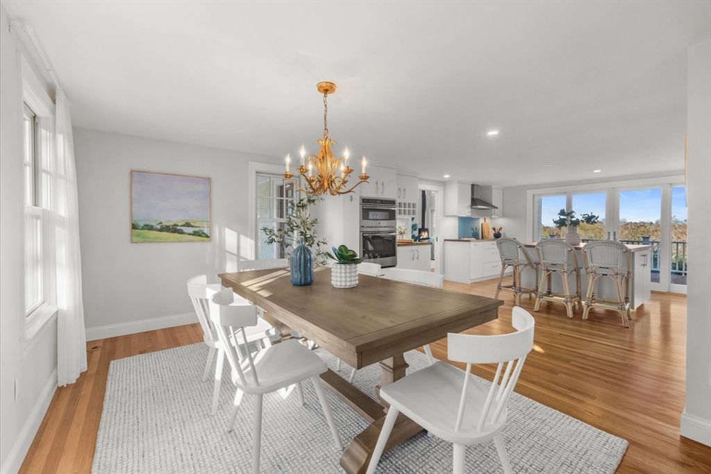 Chandelier, Dining room, Interior, Kitchen, Recessed Lighting, Stainless Steel Appliances, Wood Texture Flooring