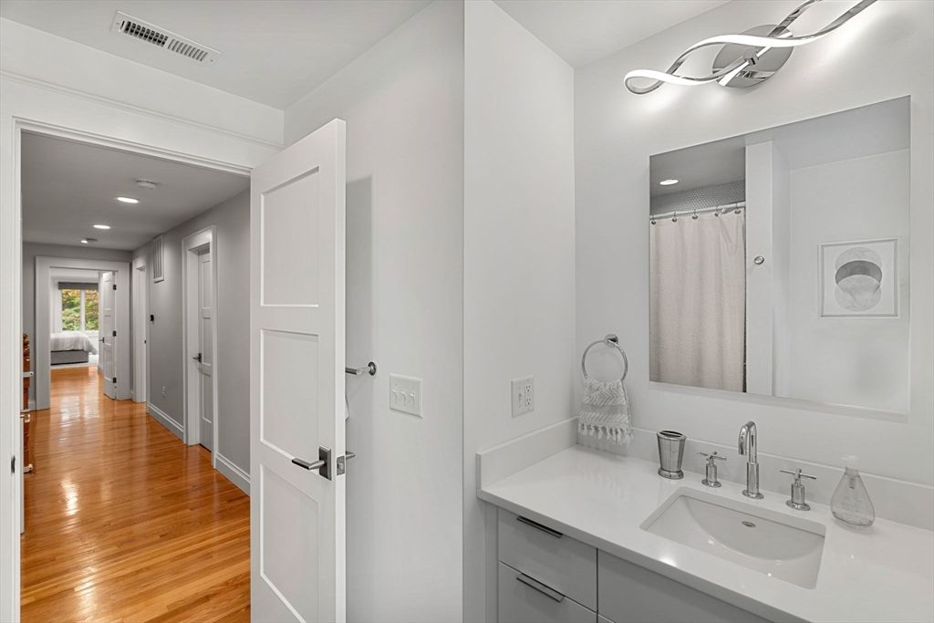 Bathroom, Dual Sink Vanities, Interior, Recessed Lighting, Wood Texture Flooring
