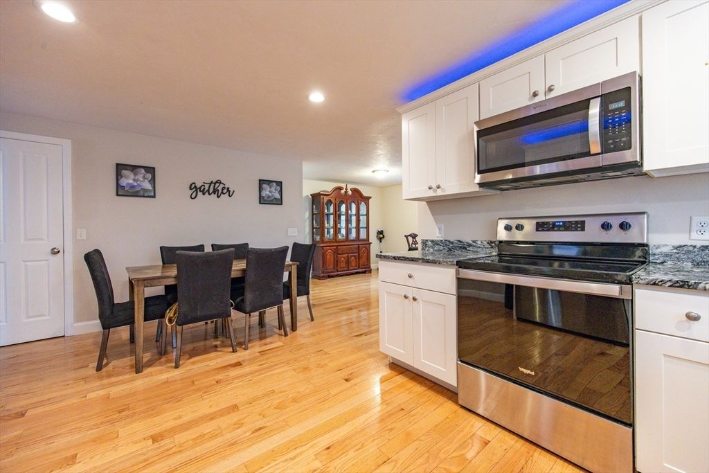 Dining room, Interior, Kitchen, Recessed Lighting, Stainless Steel Appliances, Wood Texture Flooring