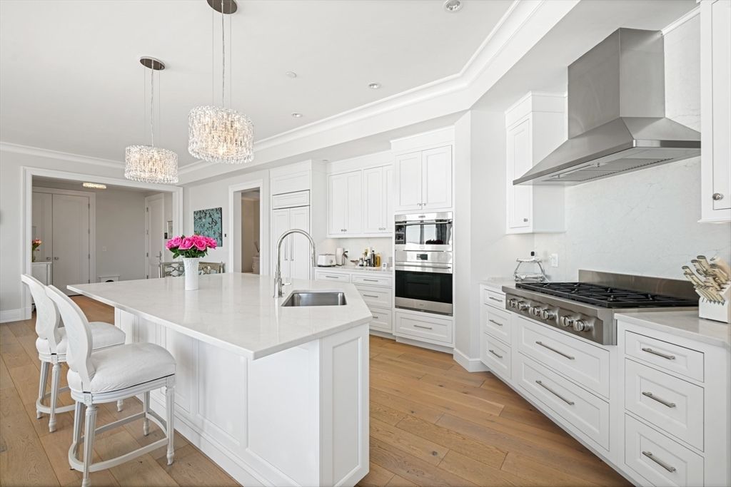 Chandelier, Interior, Kitchen, Pendant Lights, Recessed Lighting, Stainless Steel Appliances, Wood Texture Flooring