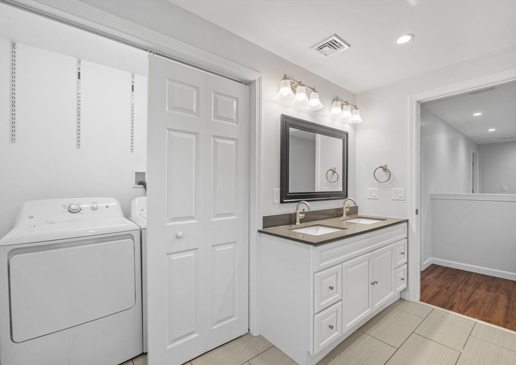 Bathroom, Interior, Recessed Lighting, Utility Closets, Washer, Wood Texture Flooring