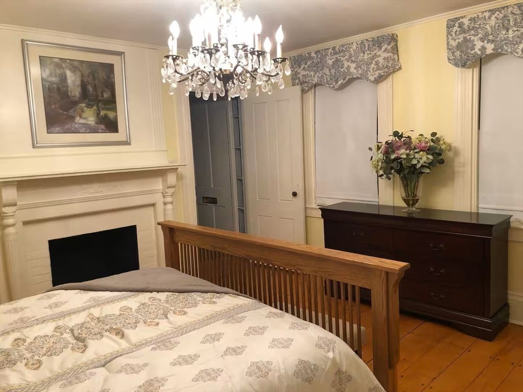 Bedroom, Chandelier, Fireplace, Interior, Wood Texture Flooring