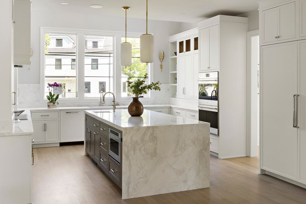 Interior, Kitchen, Marble Walls, Pendant Lights, Recessed Lighting, Stainless Steel Appliances, Wood Texture Flooring