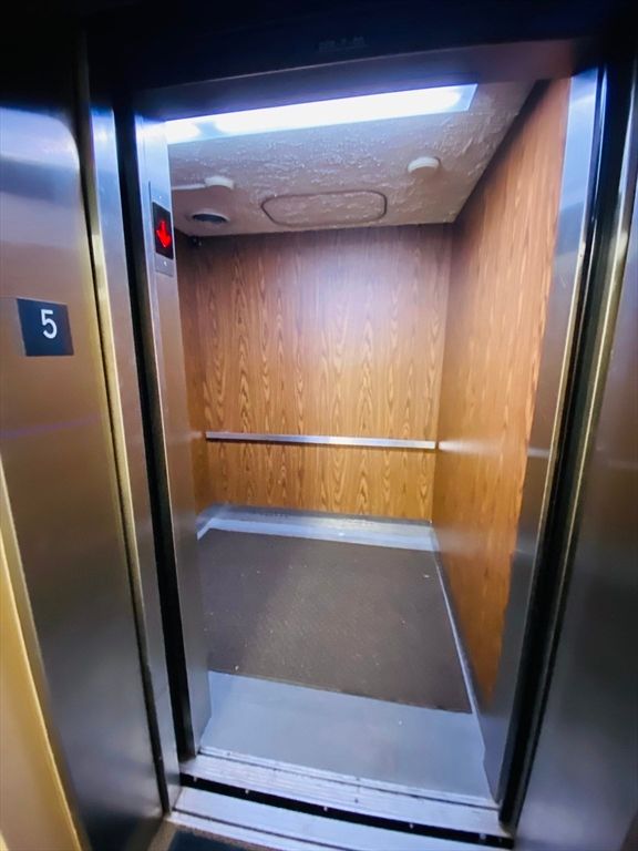 Elevator, Interior, Recessed Lighting, Wooden Walls