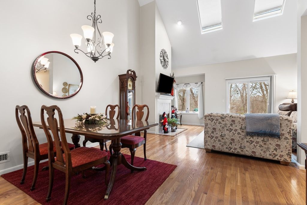 Chandelier, Dining room, Fireplace, Interior, Recessed Lighting, Wood Texture Flooring