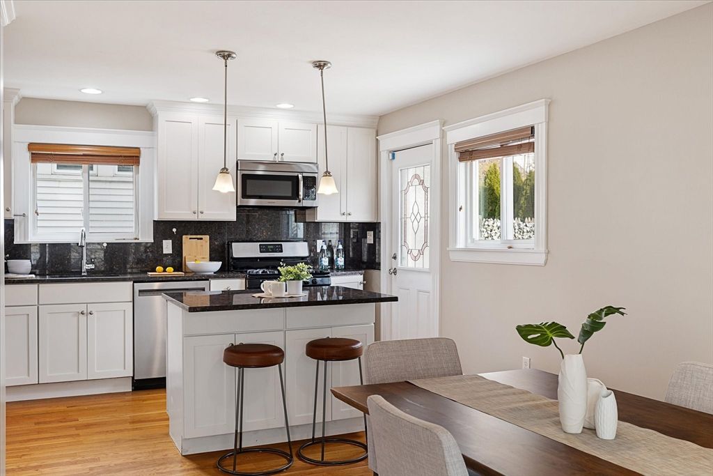 Dining room, Interior, Kitchen, Pendant Lights, Recessed Lighting, Stainless Steel Appliances, Wood Texture Flooring