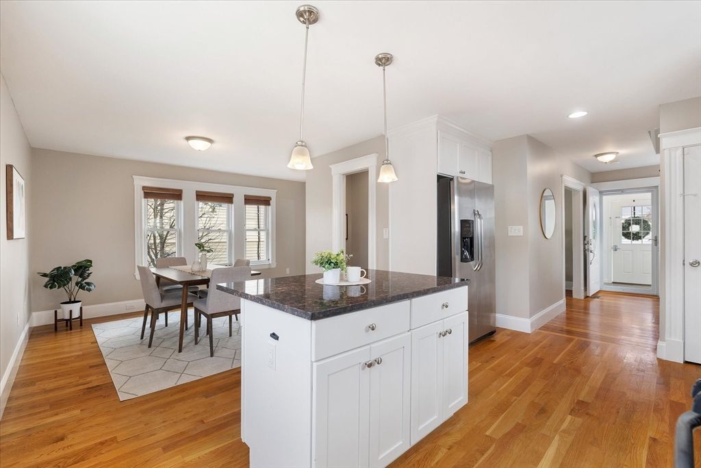 Dining room, Interior, Kitchen, Pendant Lights, Recessed Lighting, Stainless Steel Appliances, Wood Texture Flooring