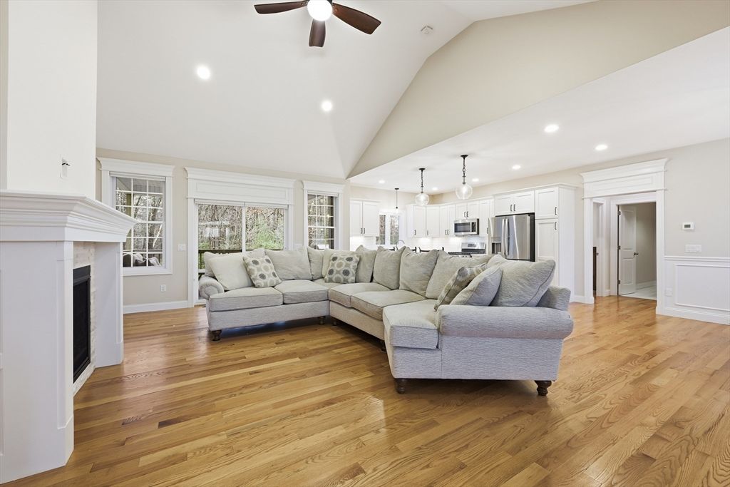 Fireplace, Interior, Kitchen, Living room, Pendant Lights, Recessed Lighting, Stainless Steel Appliances, Wood Texture Flooring