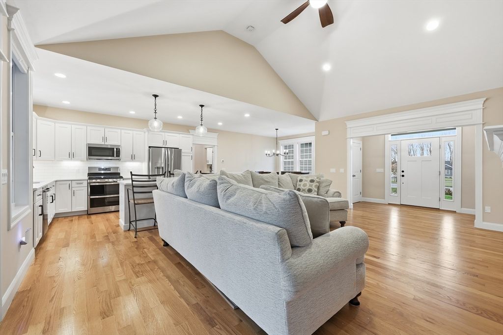 Chandelier, Interior, Kitchen, Living room, Pendant Lights, Recessed Lighting, Stainless Steel Appliances, Wood Texture Flooring