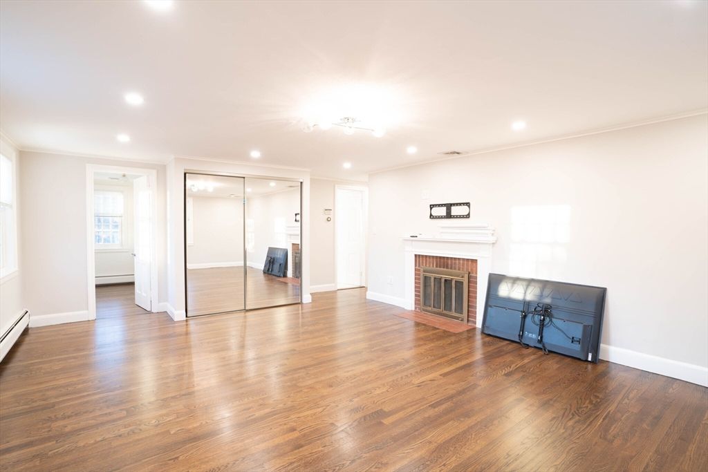 Empty room, Fireplace, Interior, Recessed Lighting, Wood Texture Flooring