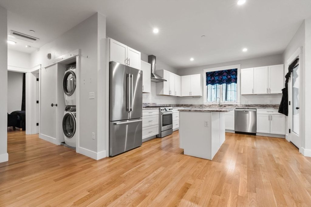 Interior, Kitchen, Recessed Lighting, Stainless Steel Appliances, Washer, Wood Texture Flooring
