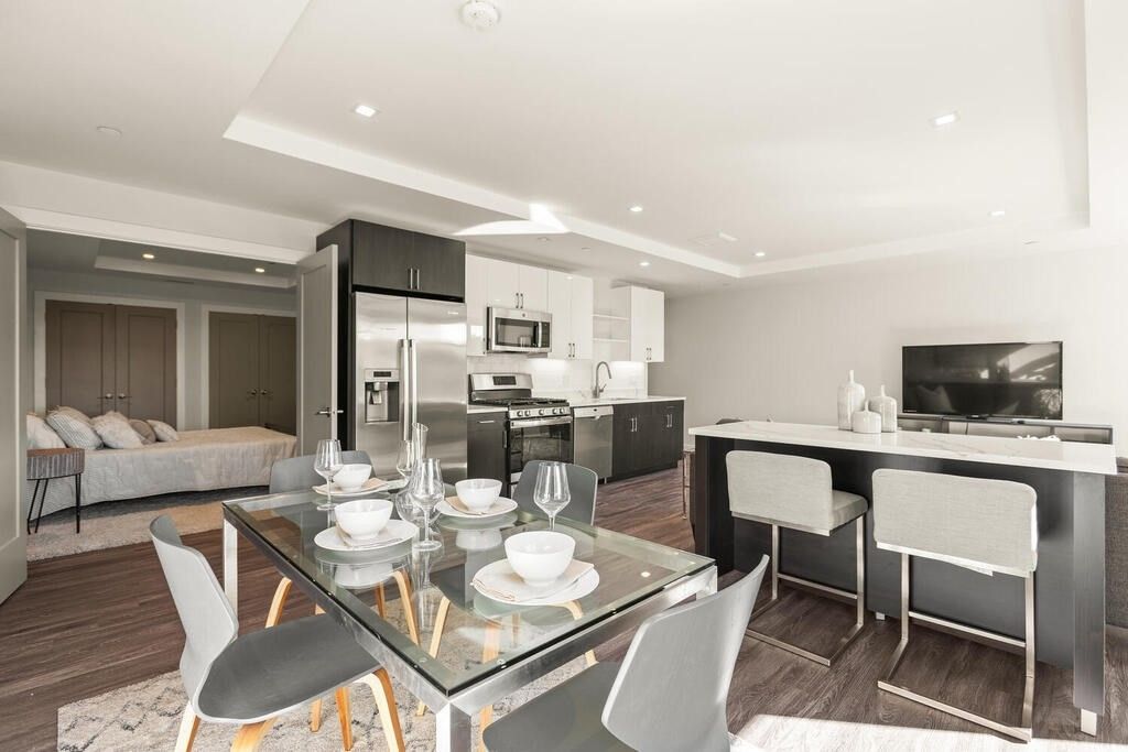 Dining room, Interior, Kitchen, Living room, Recessed Lighting, Stainless Steel Appliances, Wood Texture Flooring