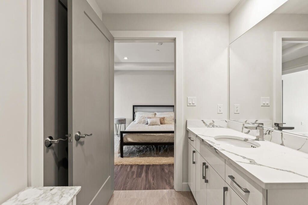 Bathroom, Bedroom, Dual Sink Vanities, Interior, Recessed Lighting, Wood Texture Flooring