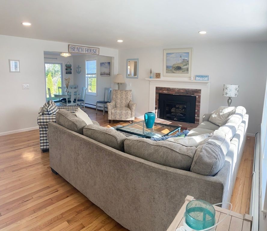 Dining room, Fireplace, Interior, Living room, Recessed Lighting, Wood Texture Flooring