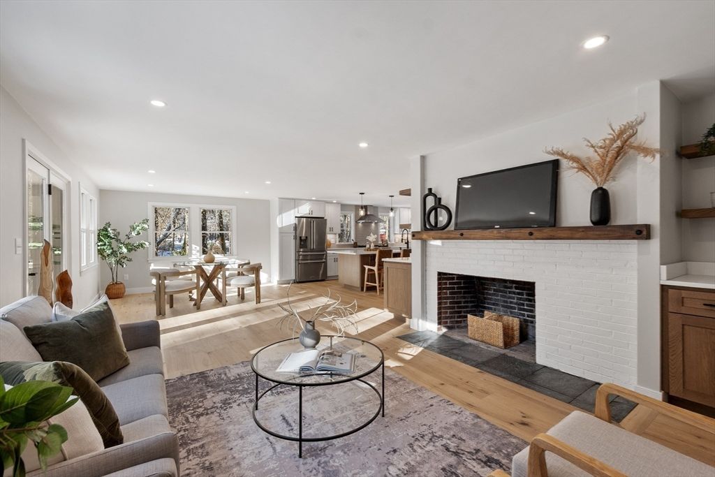 Dining room, Fireplace, Interior, Kitchen, Living room, Pendant Lights, Recessed Lighting, Stainless Steel Appliances, Wood Texture Flooring