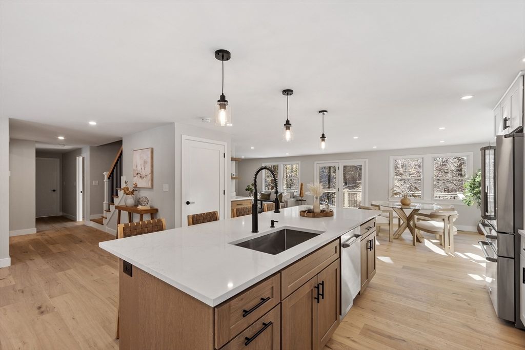 Dining room, Interior, Kitchen, Pendant Lights, Recessed Lighting, Stainless Steel Appliances, Wood Texture Flooring