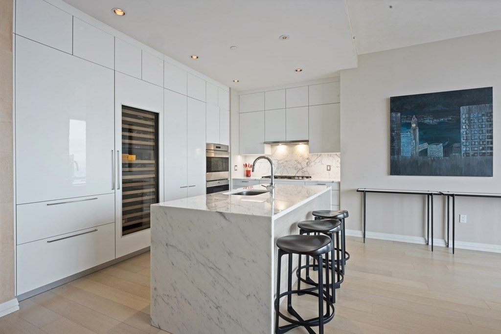 Interior, Kitchen, Marble Walls, Recessed Lighting, Stainless Steel Appliances, Wood Texture Flooring