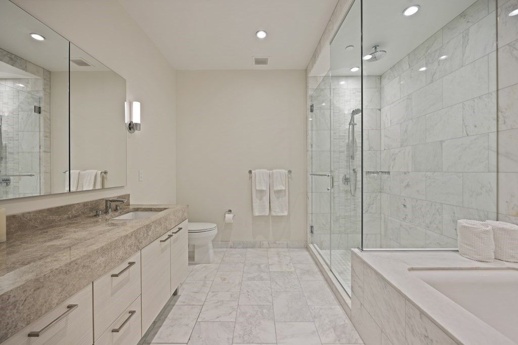 Bathroom, Dual Sink Vanities, Glass Shower, Interior, Marble, Marble Walls, Recessed Lighting