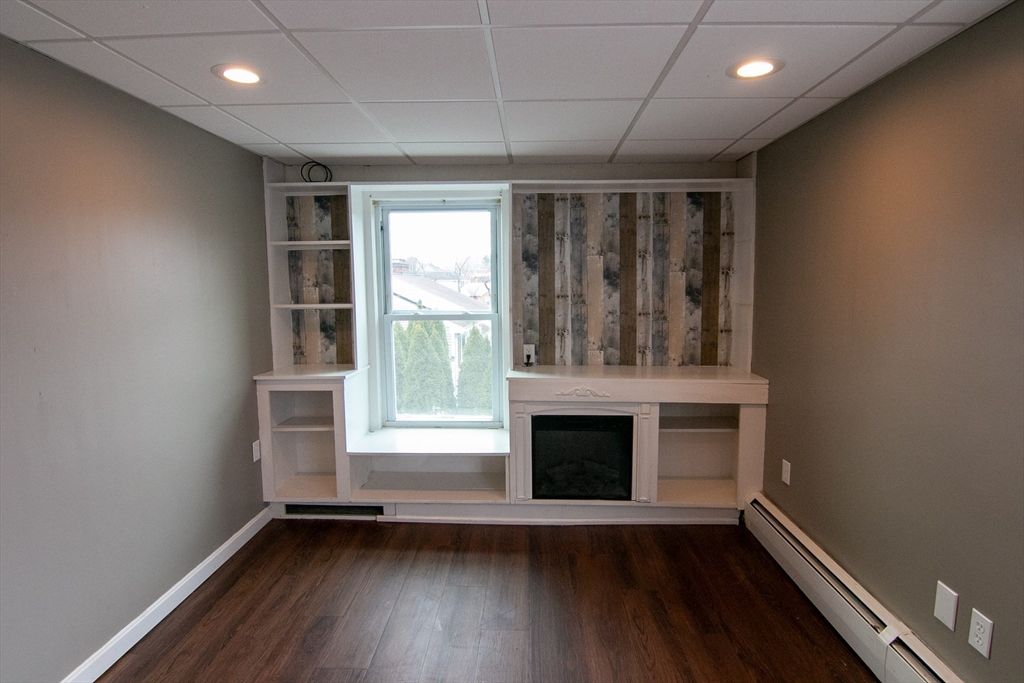 Empty room, Fireplace, Interior, Recessed Lighting, Wood Texture Flooring