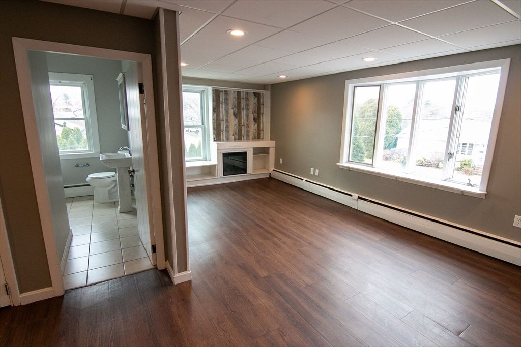Bathroom, Empty room, Fireplace, Interior, Recessed Lighting, Wood Texture Flooring