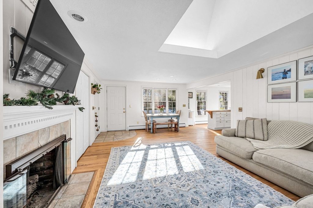 Dining room, Fireplace, Interior, Living room, Recessed Lighting, Wood Texture Flooring
