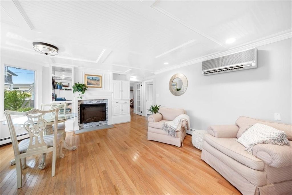 Dining room, Fireplace, Interior, Living room, Recessed Lighting, Wood Texture Flooring