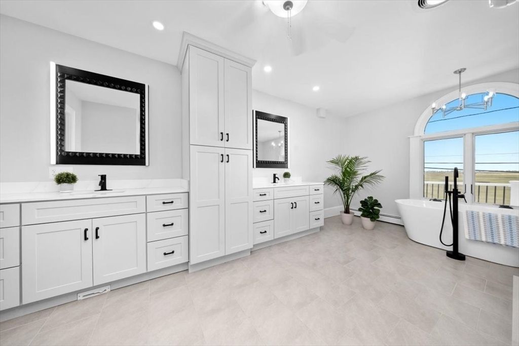 Bathroom, Chandelier, Dual Sink Vanities, Free Standing Baths, Interior, Recessed Lighting