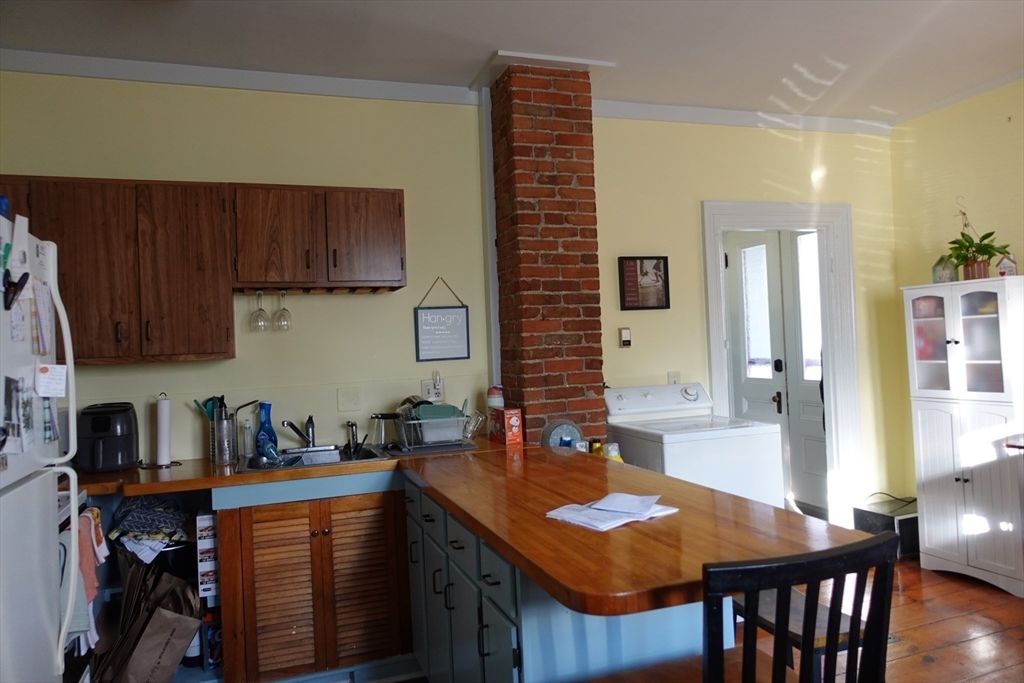 Interior, Kitchen, Stone Walls, Washer, Wood Texture Flooring