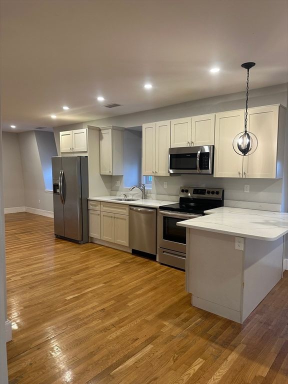 Interior, Kitchen, Pendant Lights, Recessed Lighting, Stainless Steel Appliances, Wood Texture Flooring