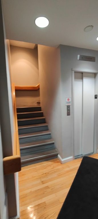 Elevator, Interior, Recessed Lighting, Wood Texture Flooring