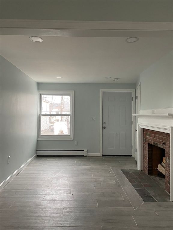 Empty room, Fireplace, Interior, Recessed Lighting, Wood Texture Flooring