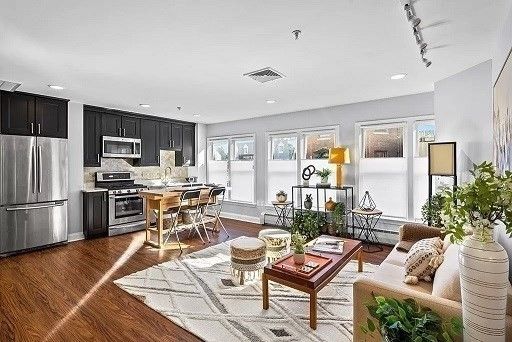 Dining room, Interior, Kitchen, Living room, Recessed Lighting, Stainless Steel Appliances, Wood Texture Flooring