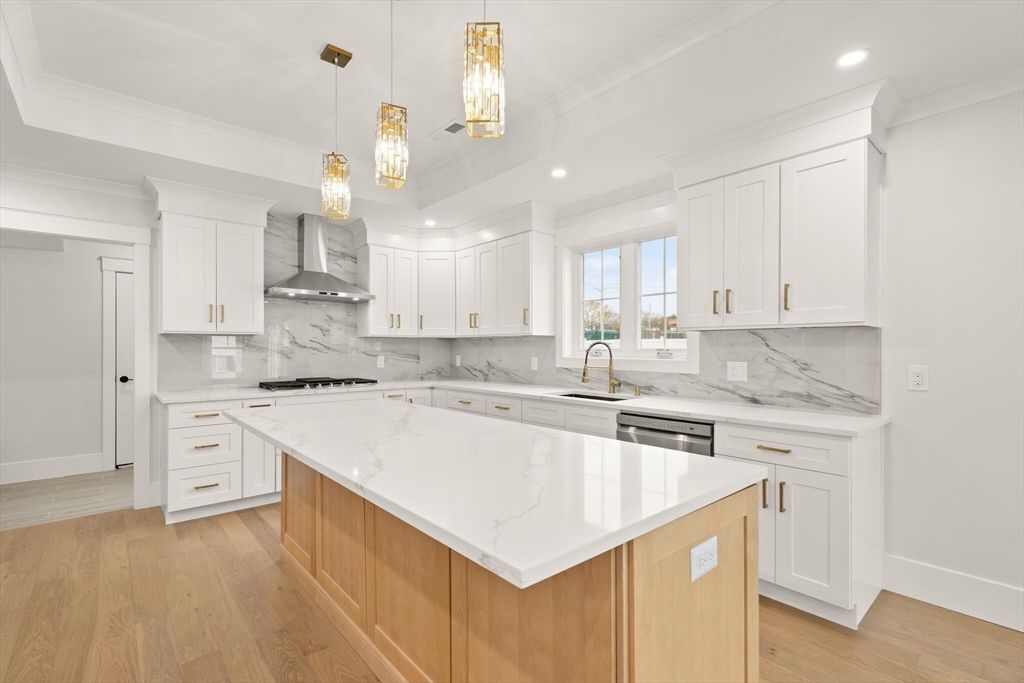 Interior, Kitchen, Marble Walls, Pendant Lights, Recessed Lighting, Stainless Steel Appliances, Wood Texture Flooring