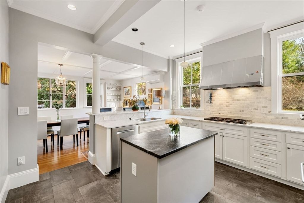 Chandelier, Dining room, Interior, Kitchen, Pendant Lights, Recessed Lighting, Stainless Steel Appliances, Wood Texture Flooring