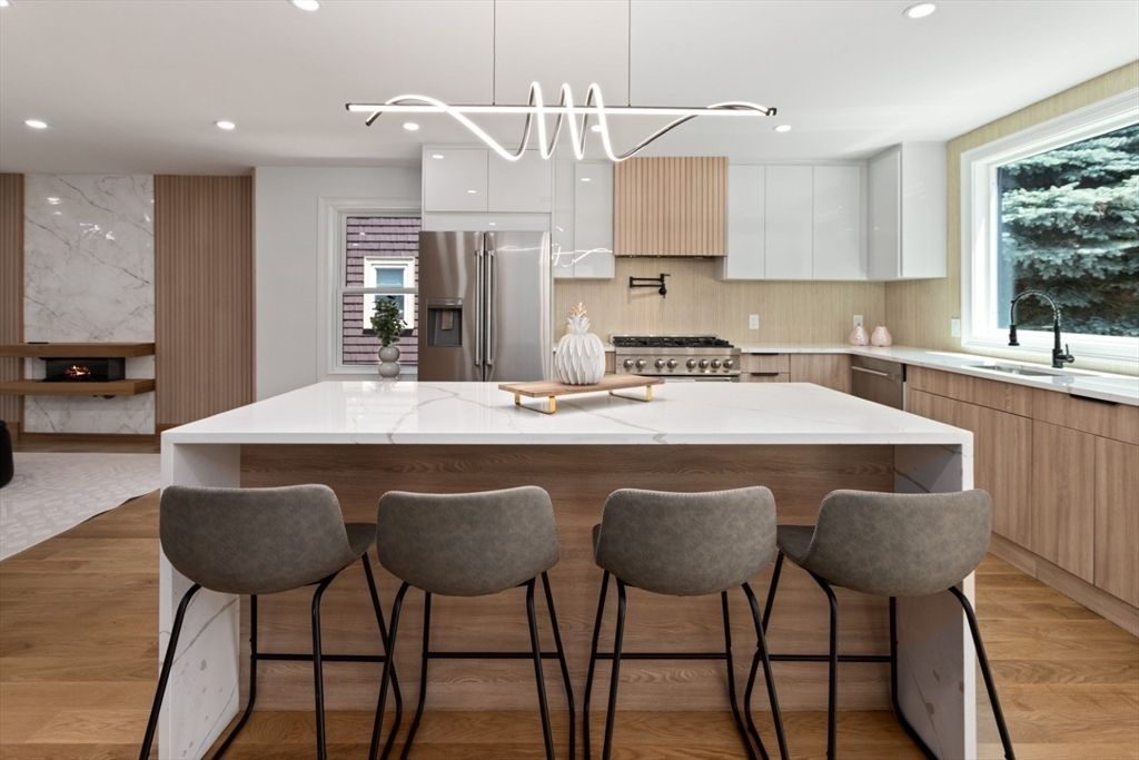Interior, Kitchen, Marble Walls, Pendant Lights, Recessed Lighting, Stainless Steel Appliances, Wood Texture Flooring