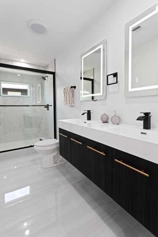 Bathroom, Dual Sink Vanities, Glass Shower, Interior, Marble Walls, Recessed Lighting