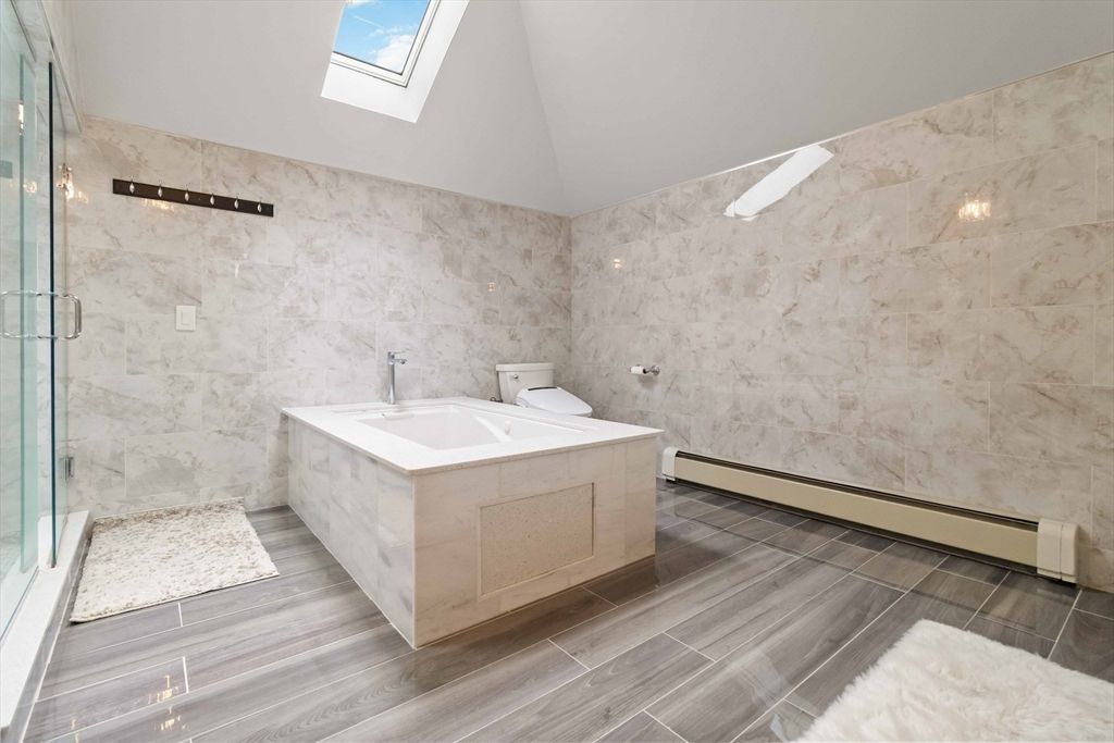 Bathroom, Glass Shower, Interior, Marble Walls, Wood Texture Flooring