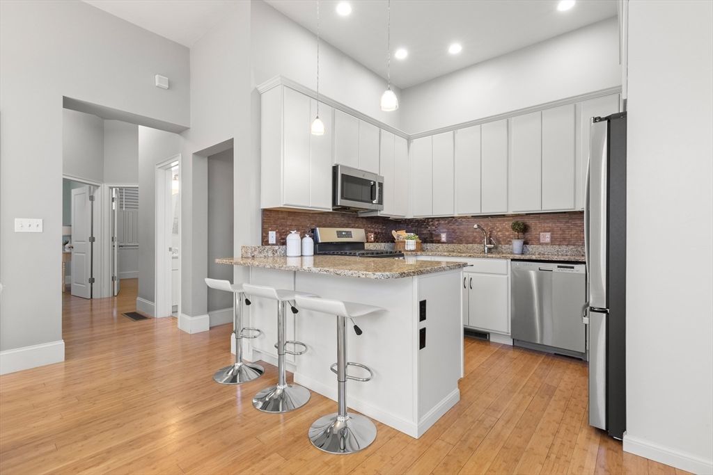 Interior, Kitchen, Pendant Lights, Recessed Lighting, Stainless Steel Appliances, Wood Texture Flooring