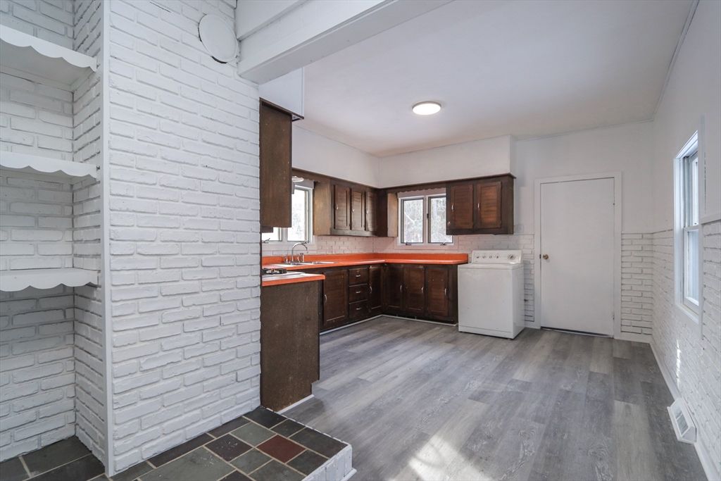 Interior, Kitchen, Stone Walls, Washer, Wood Texture Flooring