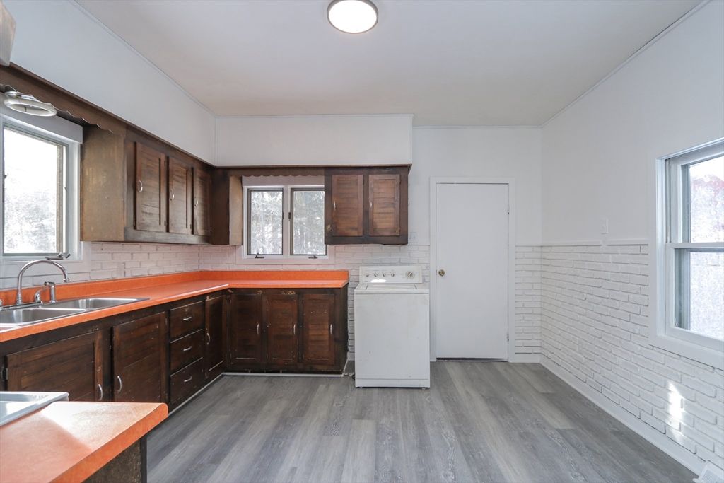 Interior, Kitchen, Recessed Lighting, Washer, Wood Texture Flooring